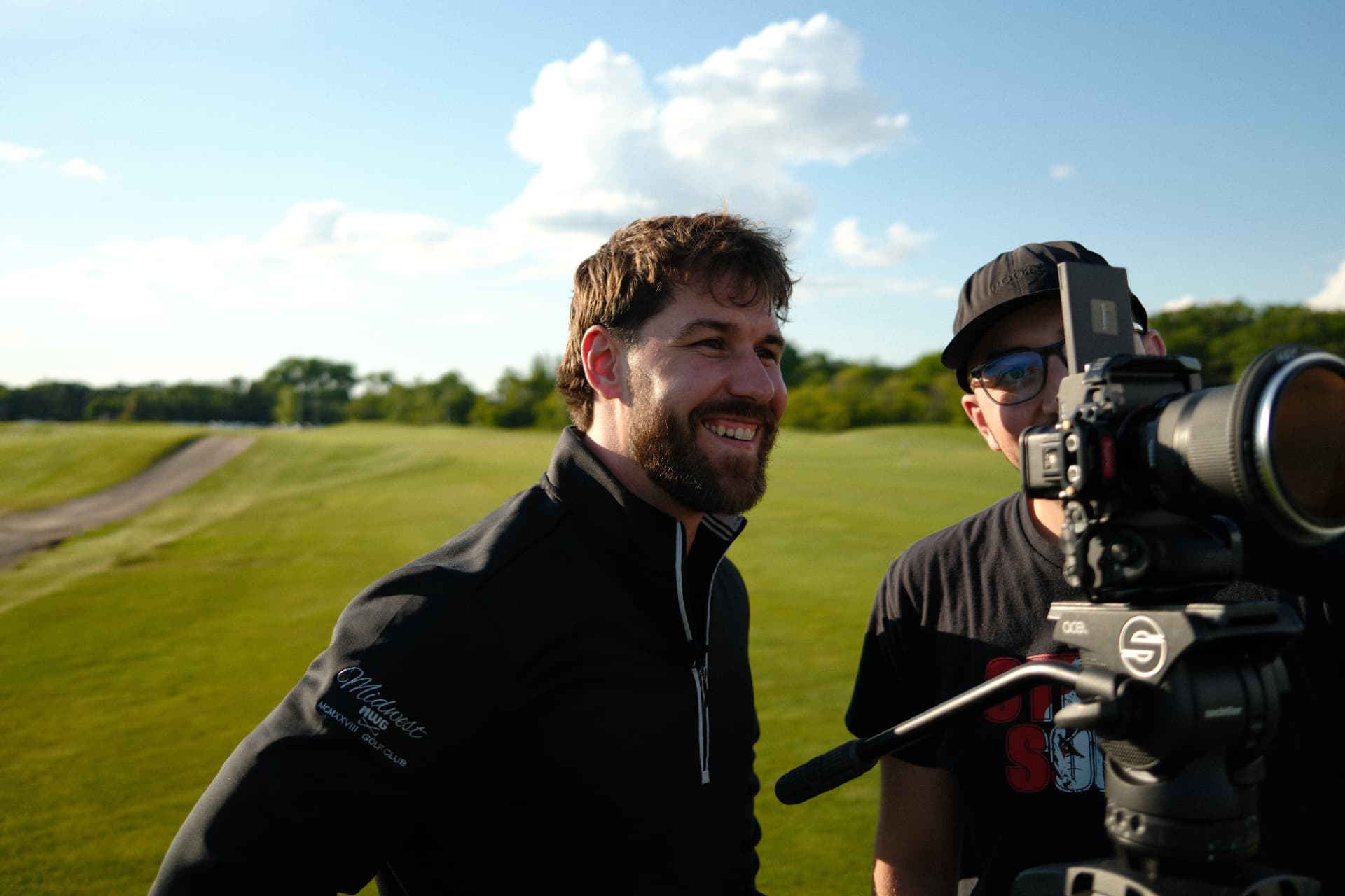 Vanguard Creative filming an on-location interview at a Winnipeg golf club